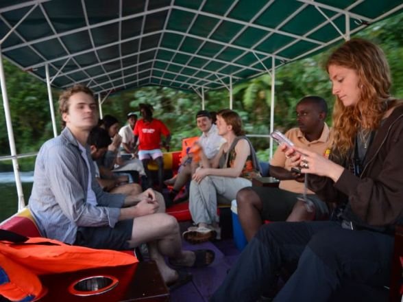 Guests on a boat safari